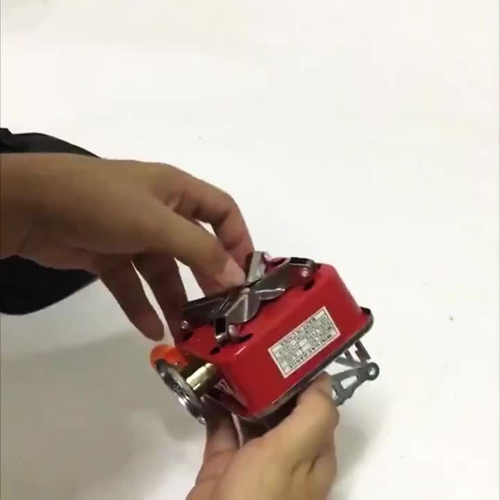 Mini Butane Camping Stove with Folding Supports and Adjustable Flame, Palm-Sized Red Portable Gas Burner for Hiking, Picnics and Outdoor Cooking